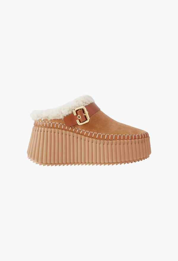 Nama Buckled Shearling-Lined Suede Platform Mules