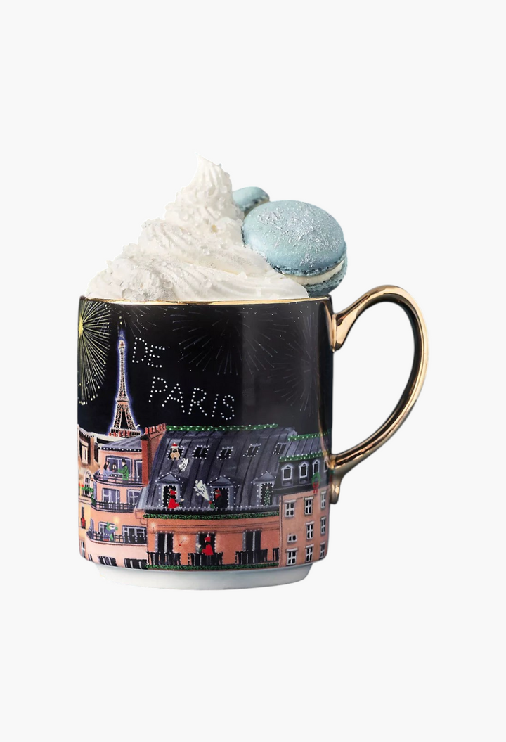 GLAM MODA Holiday in the City stoneware mug featuring a Parisian streetscape illustration and gold-painted handle.