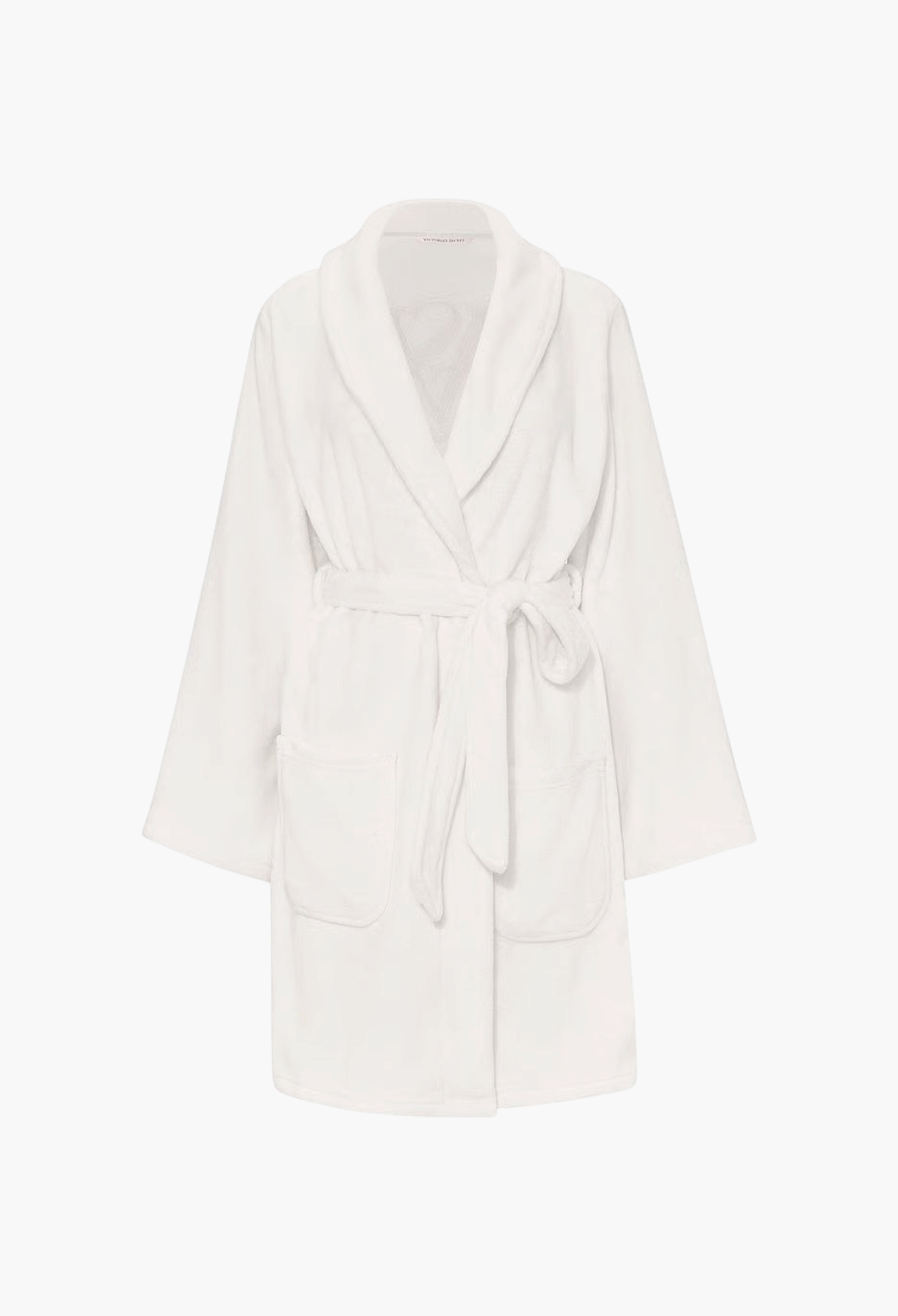 GLAM MODA white plush robe with a shawl collar, tie waist belt, and side pockets in soft polyester fabric.