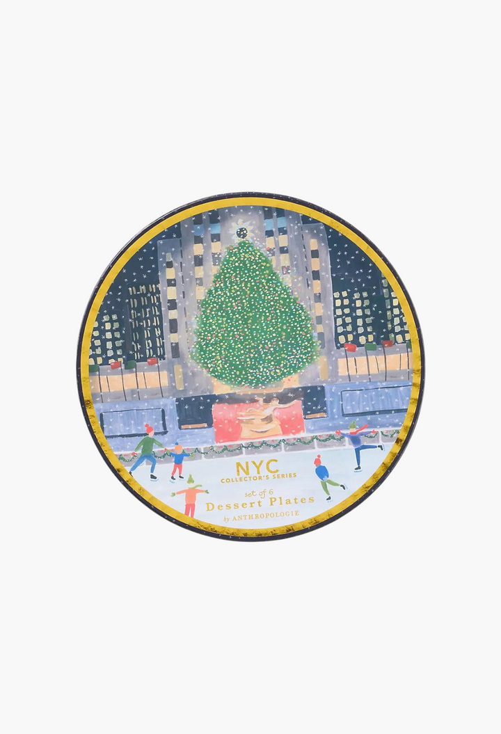 GLAM MODA Holiday in the City stoneware dessert plates set featuring a festive NYC ice skating scene with gold trim.