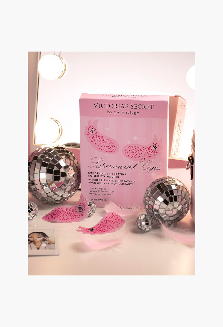 GLAM MODA Victoria's Secret x Patchology pink wing-shaped hydrating eye patches with disco ball decorations