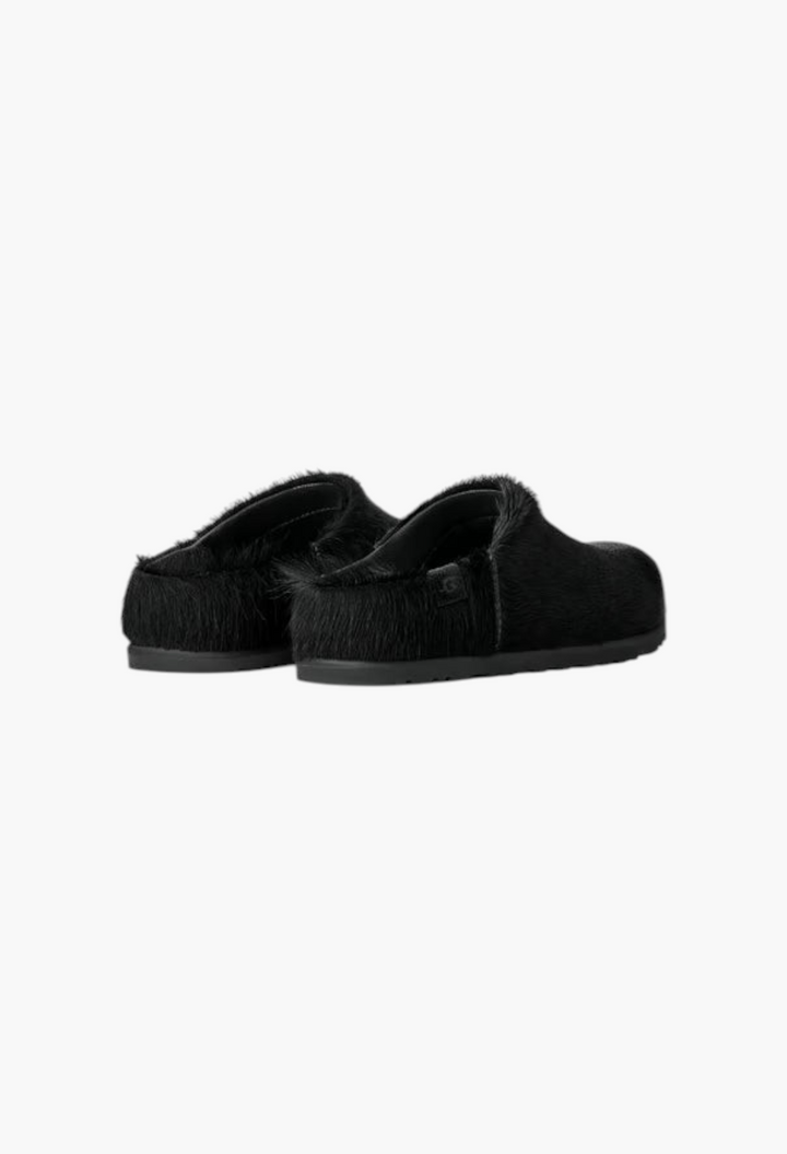 GLAM MODA Otzo black calf hair clogs with a textured upper, contoured footbed, and lightweight rubber outsole.