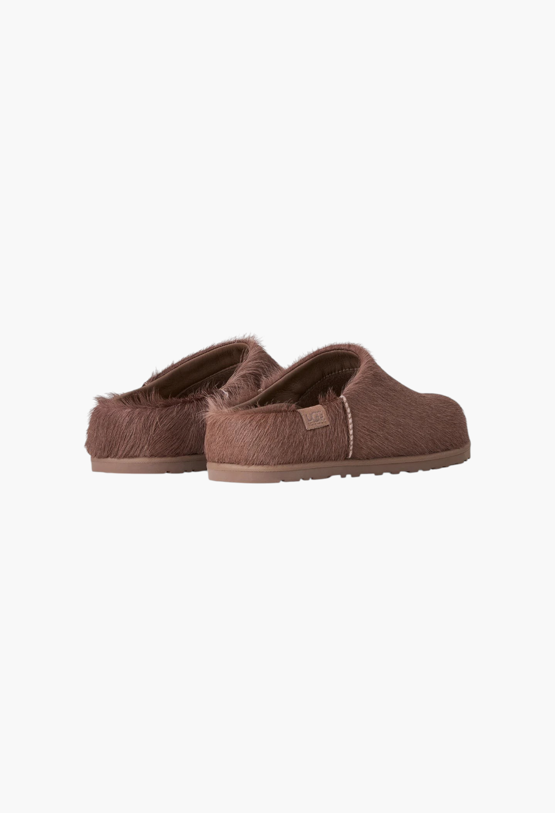 GLAM MODA Otzo brown calf hair clogs with a contoured EVA footbed and embossed UGG logo detail