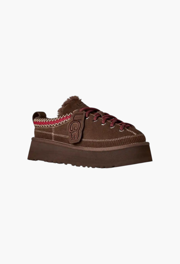 GLAM MODA brown suede lace-up platform slipper with sheepskin lining, UGG charm, and decorative red braided trim