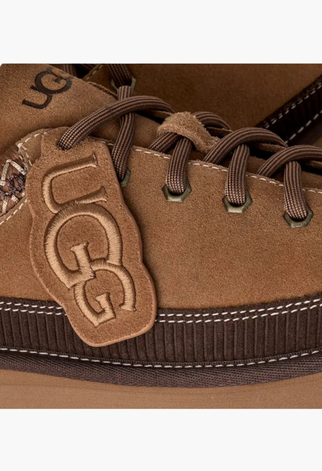 GLAM MODA brown suede lace-up slipper featuring a removable mini UGG boot charm and detailed stitching