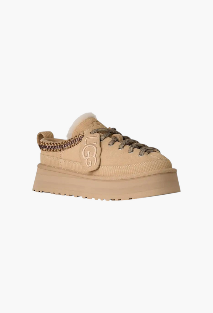 GLAM MODA beige suede lace-up platform slipper with sheepskin lining and removable UGG logo charm