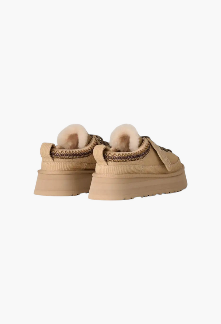 GLAM MODA women's heritage lace-up slippers in tan suede with a platform sole, sheepskin lining, and rear pull tab.