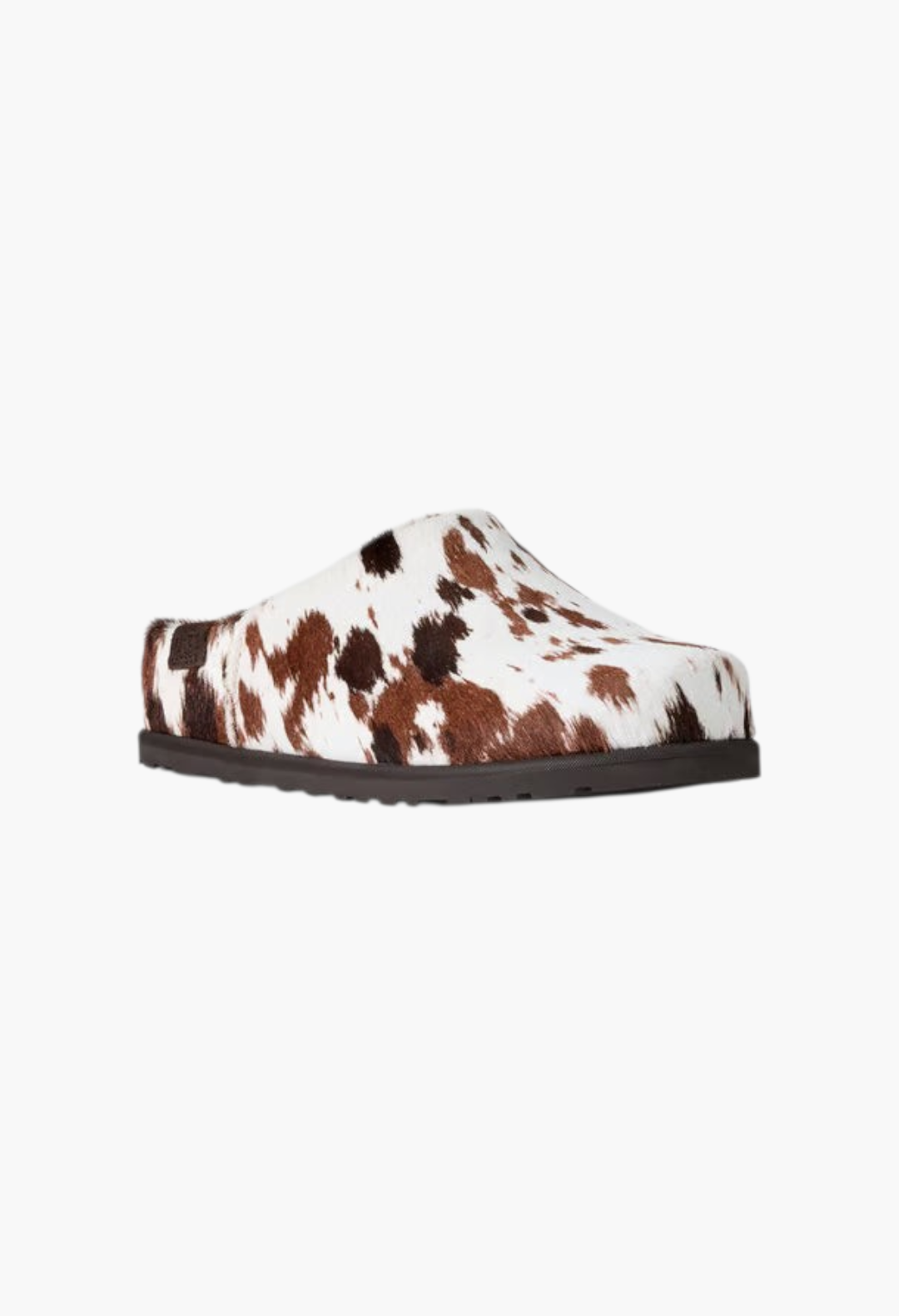 GLAM MODA Otzo Western Clog featuring a brown and white hand-painted cow hair upper and a durable rubber outsole.