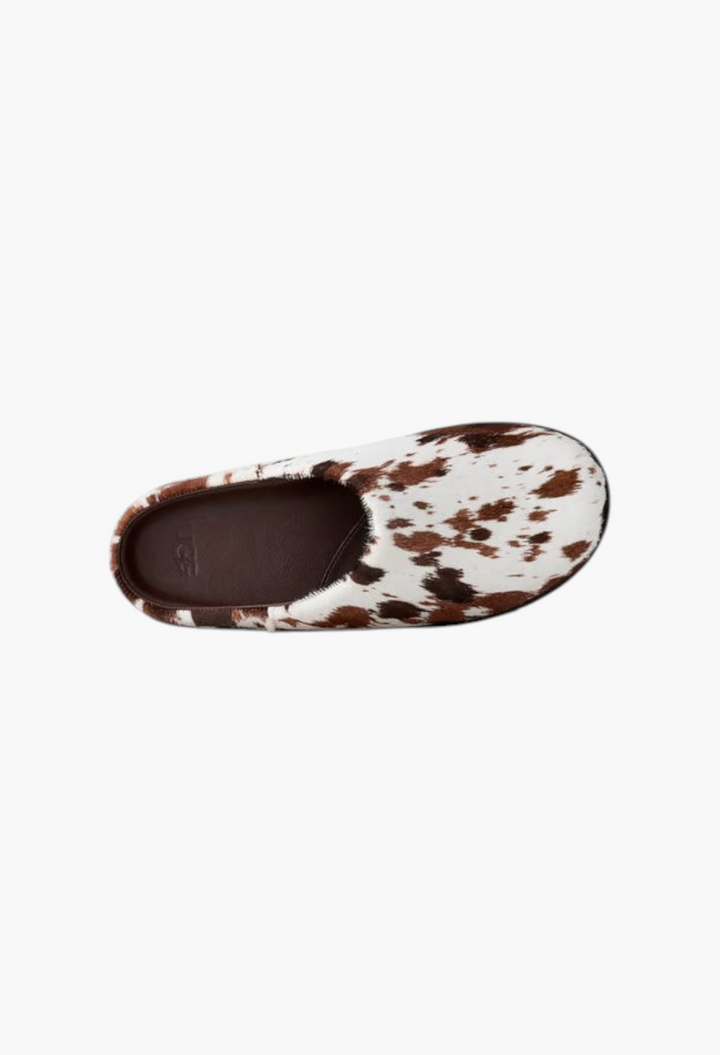 GLAM MODA Otzo Western Clog featuring a brown and white cow print calf hair upper and dark brown leather footbed