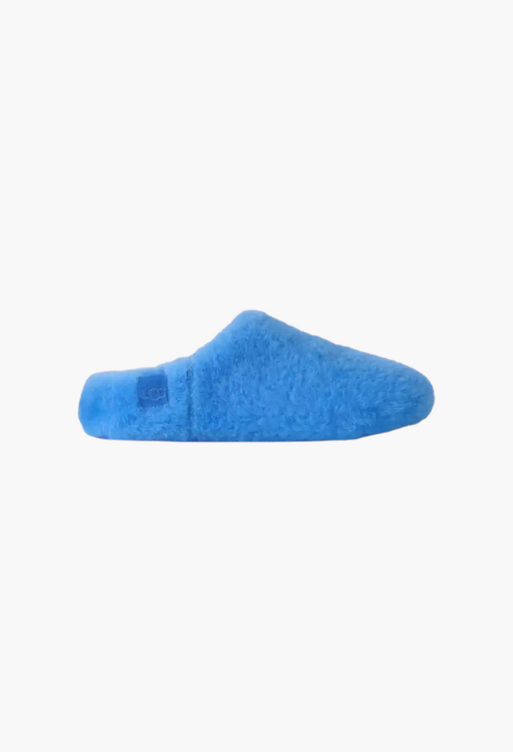 GLAM MODA bright blue sheepskin Elea fluffed slip-on slipper with a minimalist silhouette and embossed logo label.