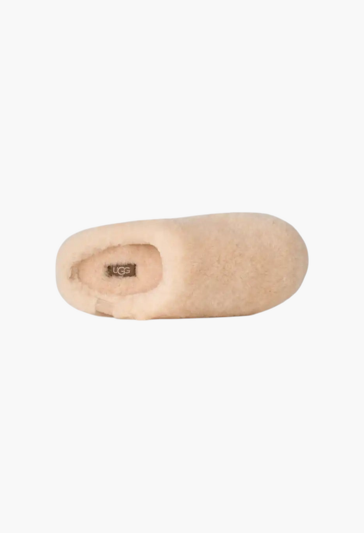 GLAM MODA beige sheepskin Elea Fluffed slip-on slipper with a minimalist design and plush interior lining.