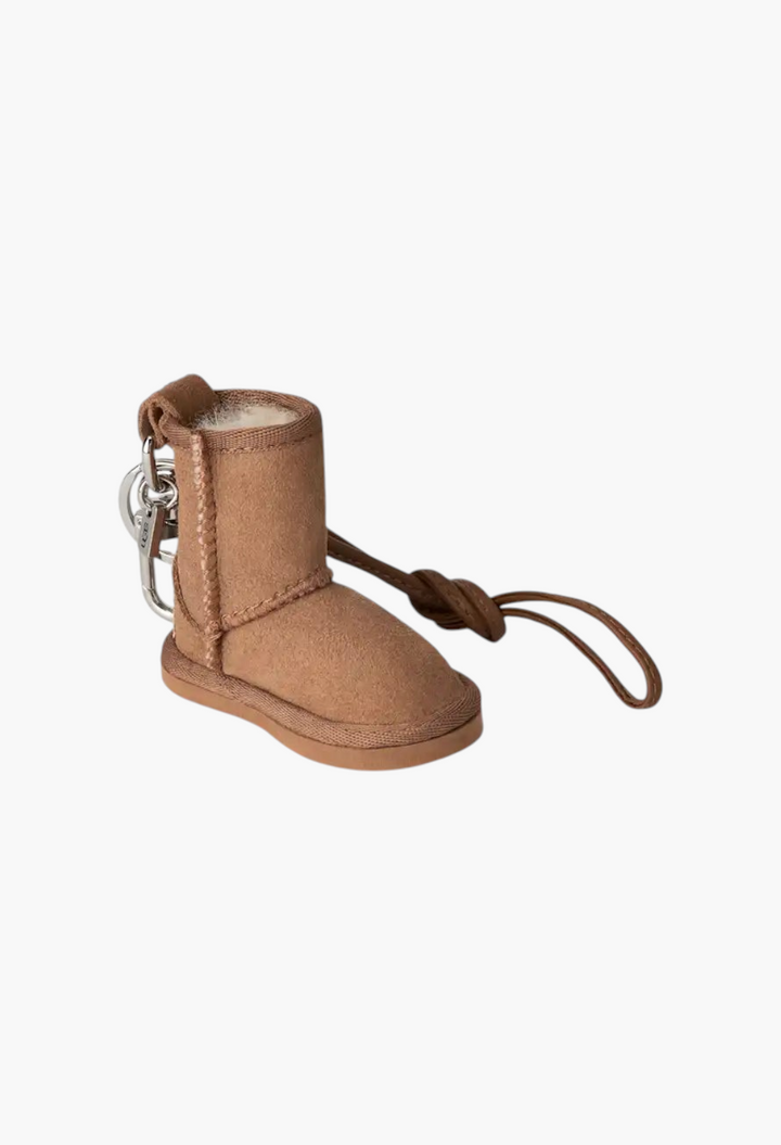 GLAM MODA classic boot charm keychain in chestnut suede with a fluffy sheepskin lining and metal dog clip attachment.