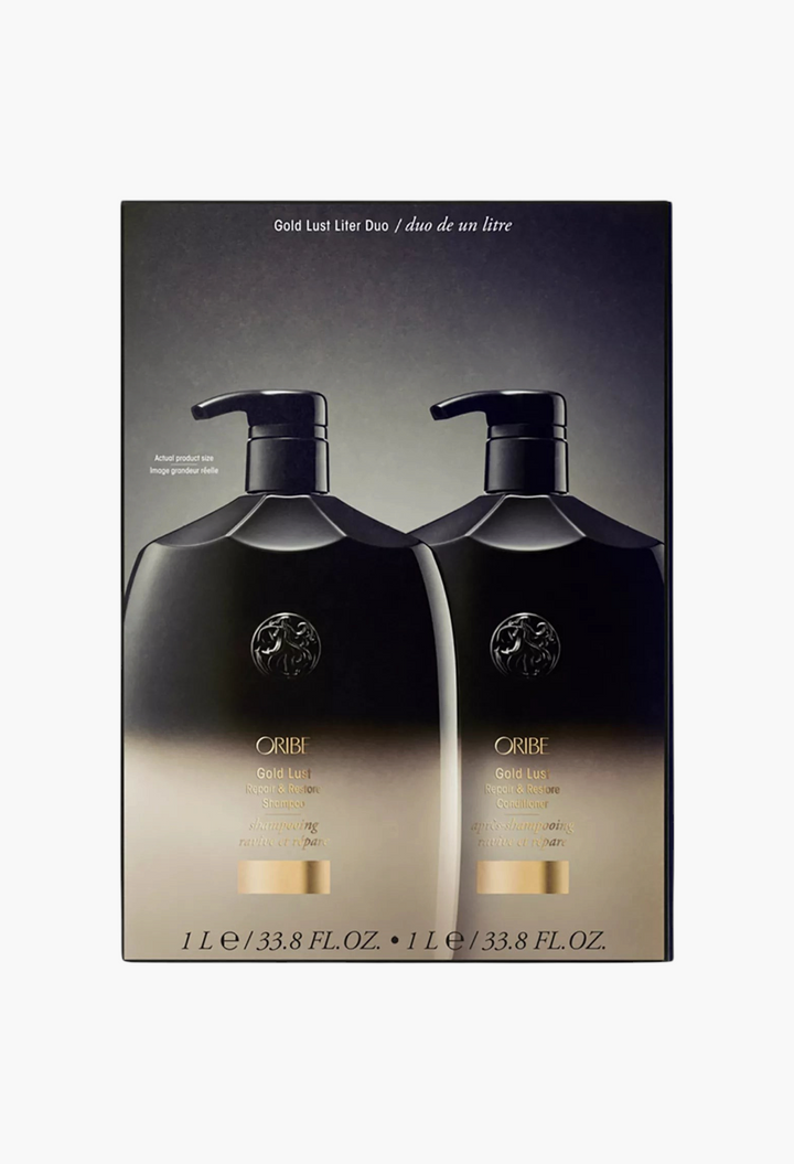 GLAM MODA Gold Lust Shampoo and Conditioner liter duo set in black and gold packaging for repairing damaged hair.