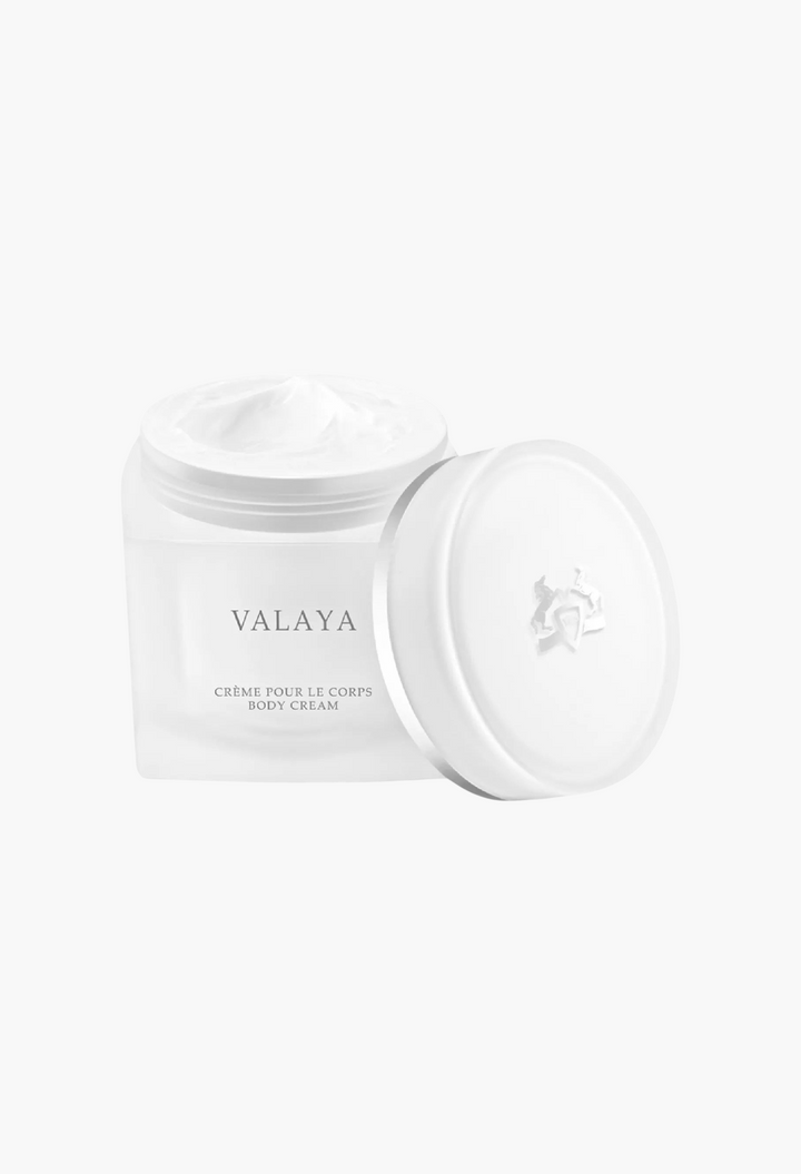 GLAM MODA Valaya refillable body cream in a white frosted glass jar with a matching lid on a plain background.
