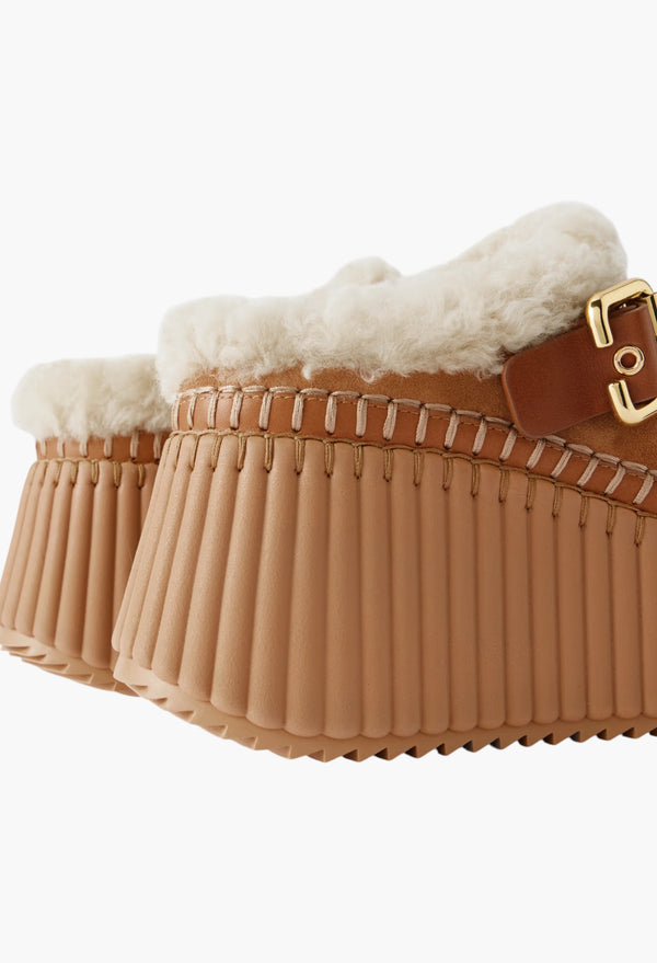 Nama Buckled Shearling-Lined Suede Platform Mules