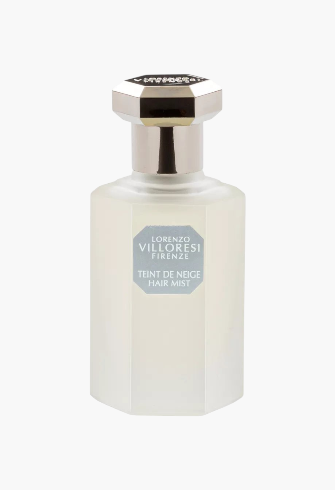 GLAM MODA Teint de Neige hair mist in a 50ml frosted glass bottle with a silver hexagonal cap.