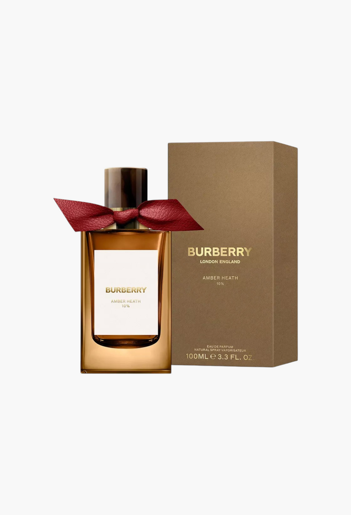 GLAM MODA Burberry Amber Heath 10% Eau de Parfum 100ml bottle with a red leather bow and matching brown gift box.