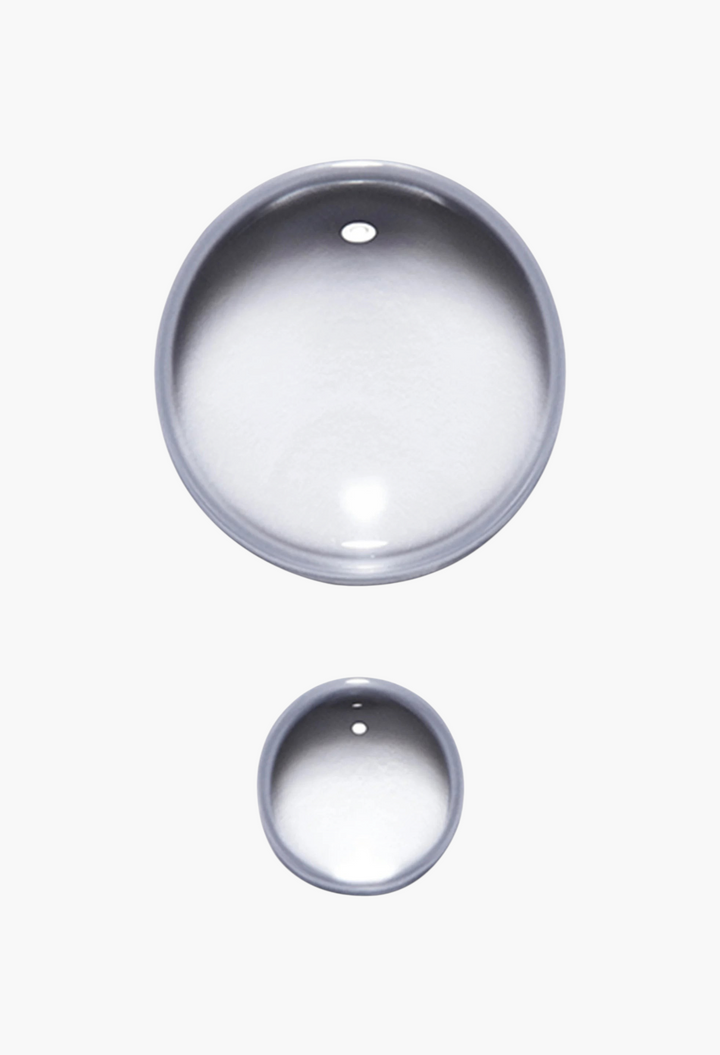 GLAM MODA Kérastase Genesis Anti-Hair Fall Scalp Serum bottle cap top view showing silver finish