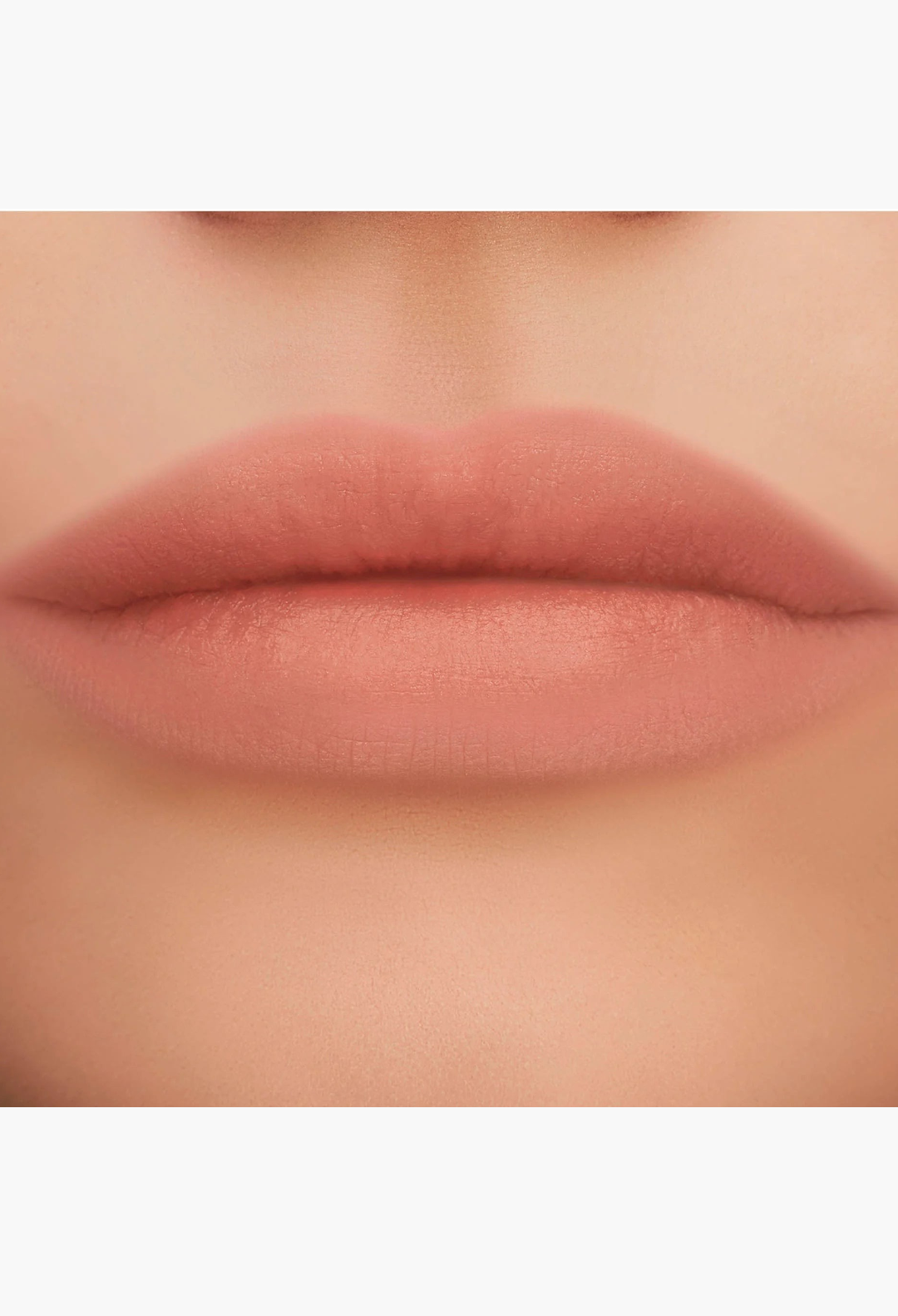GLAM MODA Yves Saint Laurent The Inks Blurring Matte Liquid Lip Stain in a soft, natural nude-pink matte finish.