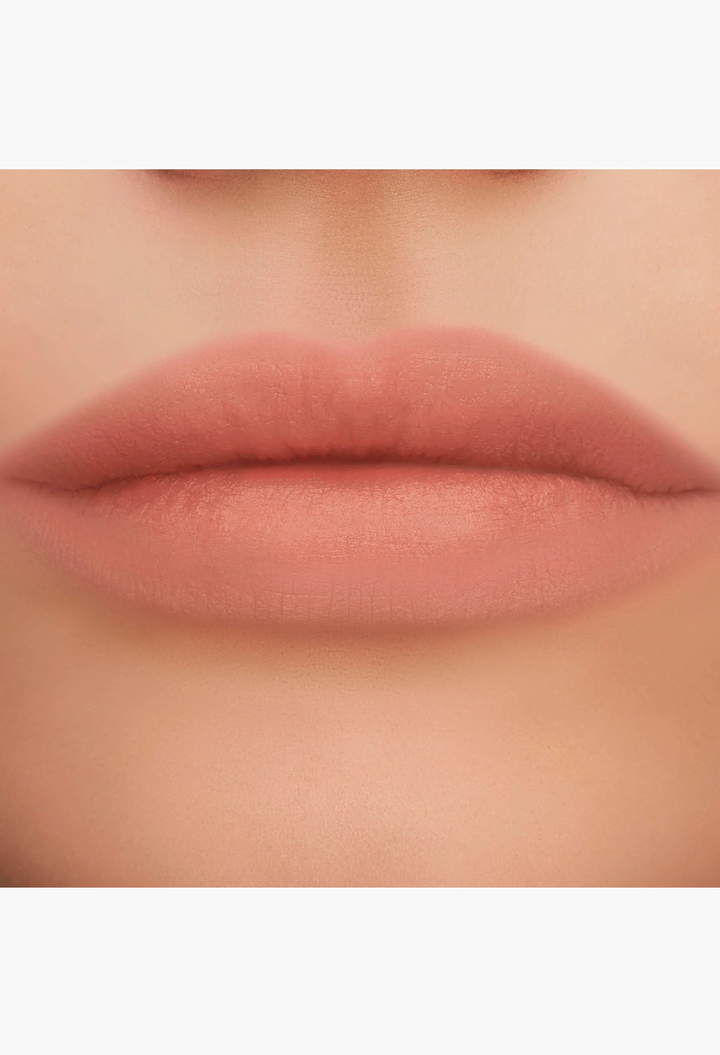 GLAM MODA Yves Saint Laurent The Inks Blurring Matte Liquid Lip Stain in a soft, natural nude-pink matte finish.