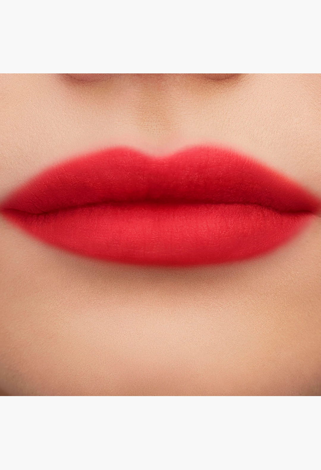 GLAM MODA Yves Saint Laurent liquid lip stain showing a soft-focus blurred matte finish on natural pink lips