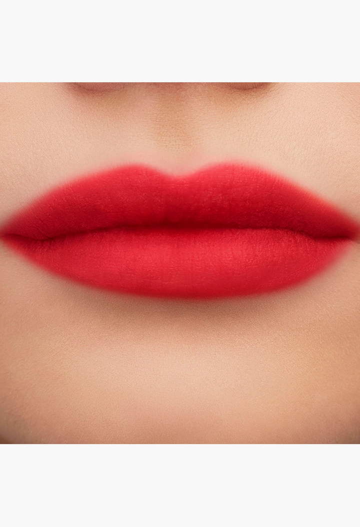 GLAM MODA Yves Saint Laurent liquid lip stain showing a soft-focus blurred matte finish on natural pink lips