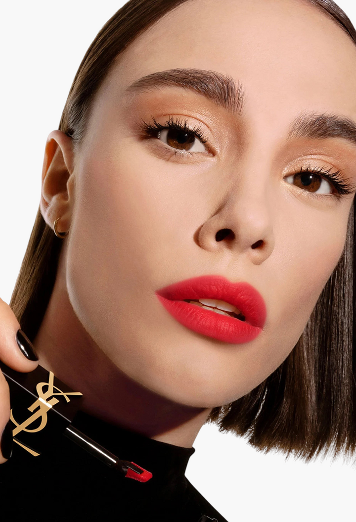 GLAM MODA model wearing Yves Saint Laurent The Inks Blurring Matte Liquid Lip Stain in a vibrant red shade
