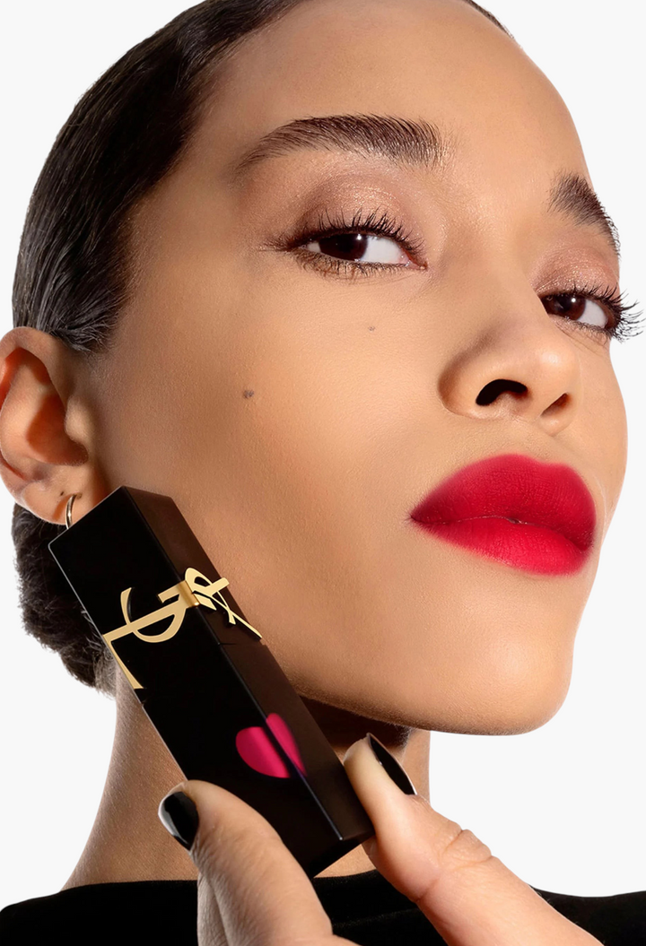 GLAM MODA model wearing Yves Saint Laurent The Inks Blurring Matte Liquid Lip Stain in a vibrant red shade
