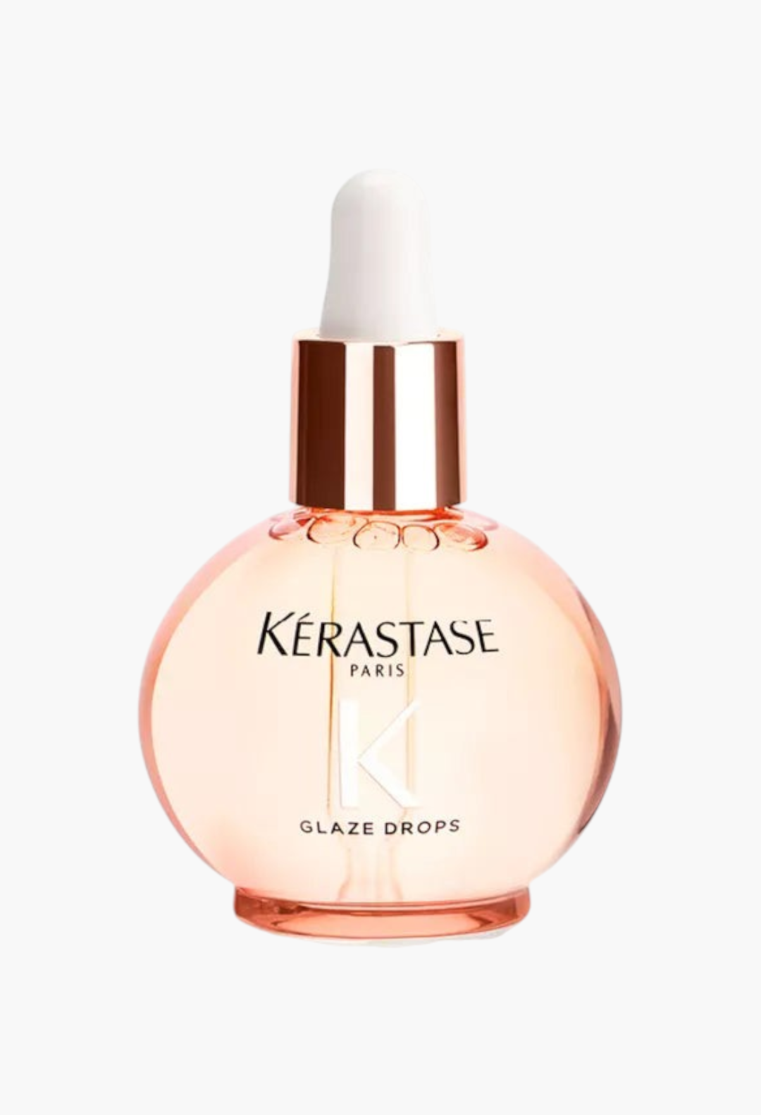 GLAM MODA Kerastase Gloss Absolu Glaze Drops in a round glass bottle for smoothing frizz on long hair