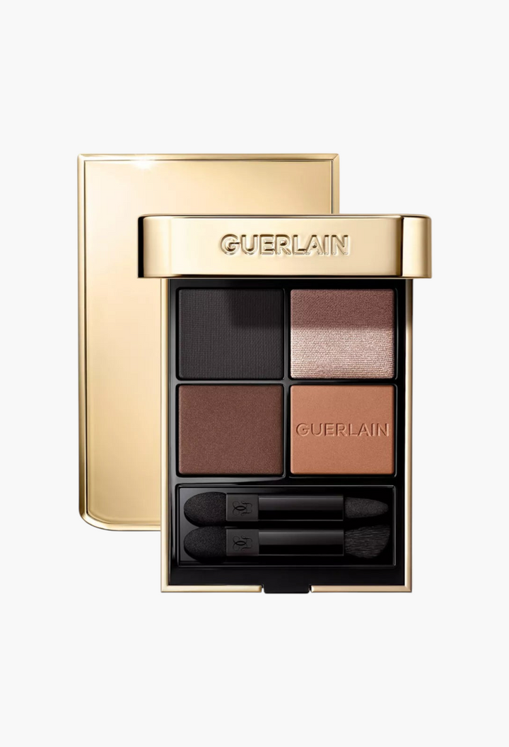 GLAM MODA Guerlain Ombres G Eyeshadow Quad in Undressed Brown with four shades in a gold compact case.