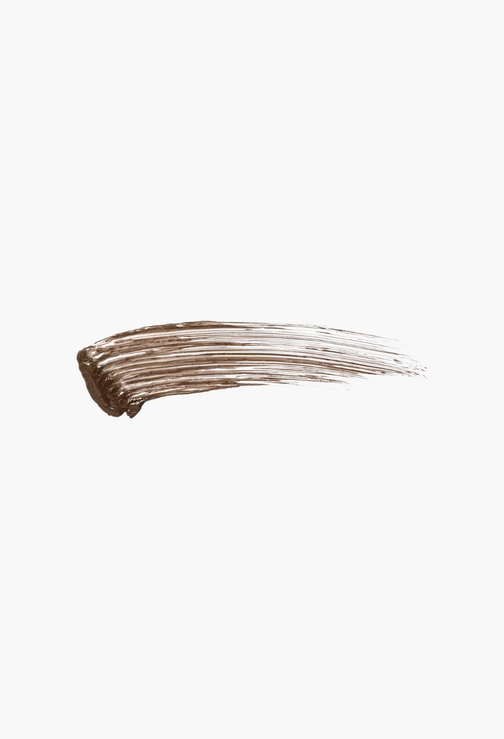 GLAM MODA Gimme Brow+ tinted volumizing eyebrow gel swatch showing natural brown pigment and fiber texture