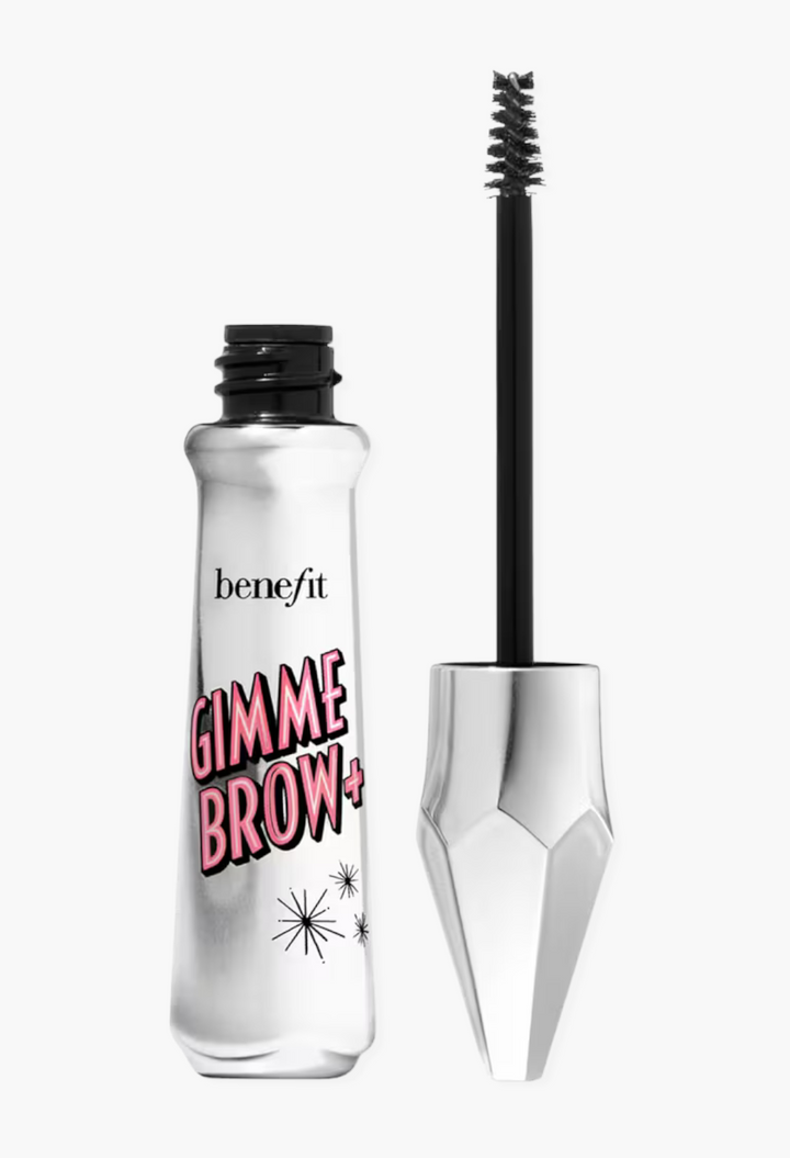 GLAM MODA Benefit Gimme Brow+ tinted volumizing eyebrow gel with a tapered applicator brush in a silver metallic tube
