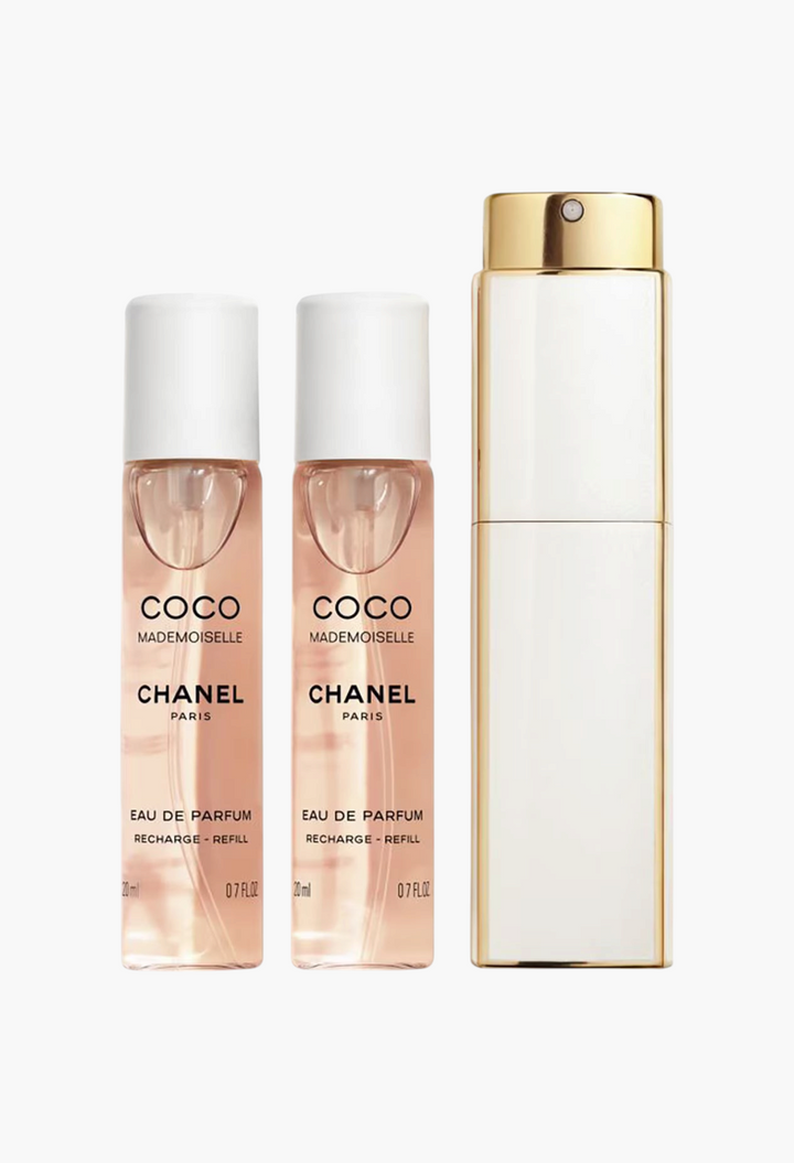 GLAM MODA CHANEL Coco Mademoiselle Eau de Parfum twist and spray set with two refill vials and a gold travel case.