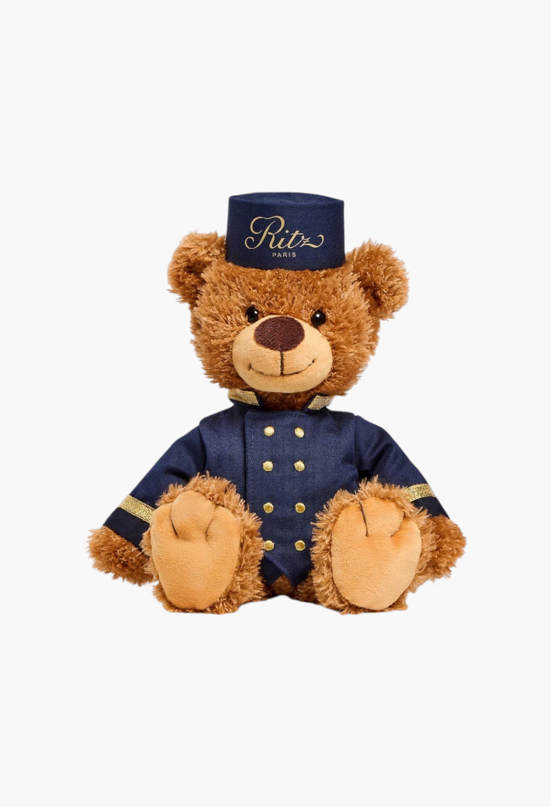 GLAM MODA large brown teddy bear dressed as a Ritz Paris bellboy in a navy blue uniform with gold buttons and hat.