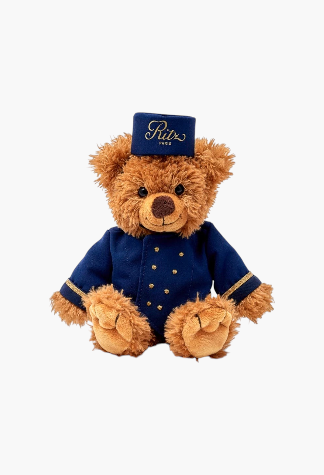 GLAM MODA large teddy bear dressed as a Ritz Paris bellboy in a navy blue uniform with a matching pillbox hat.