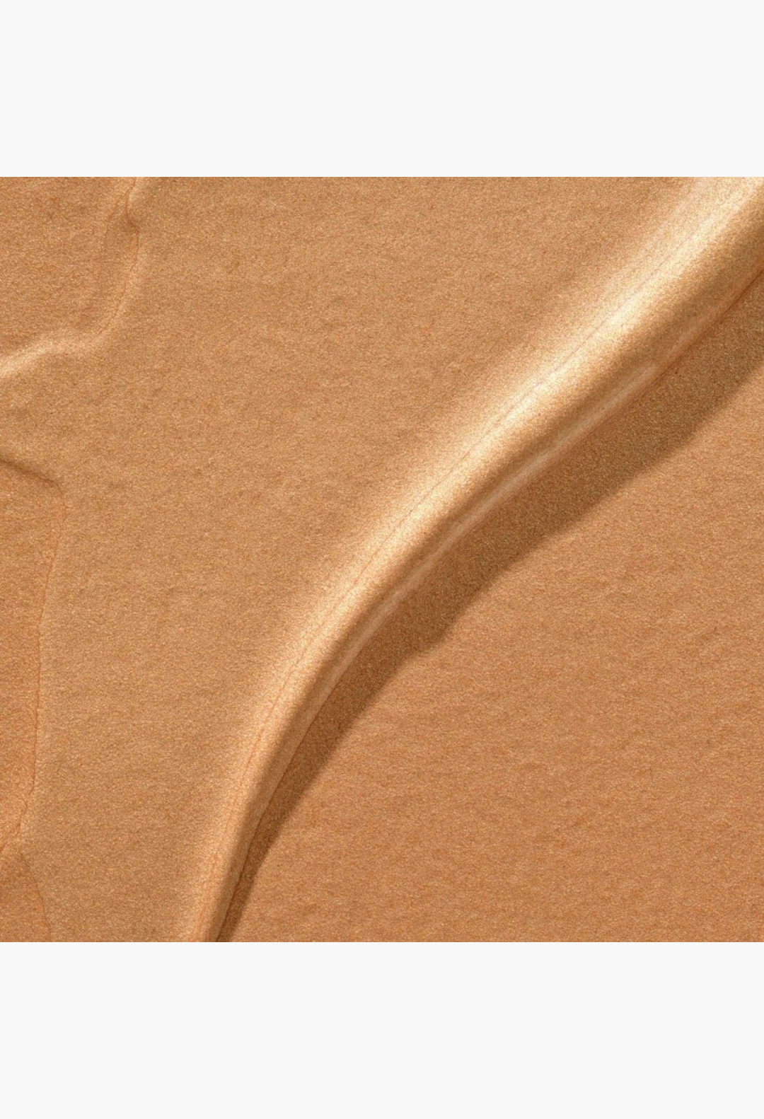 GLAM MODA Hyper Shine Lite Pigment swatch showing a creamy, radiant gold shimmer texture for face and body.