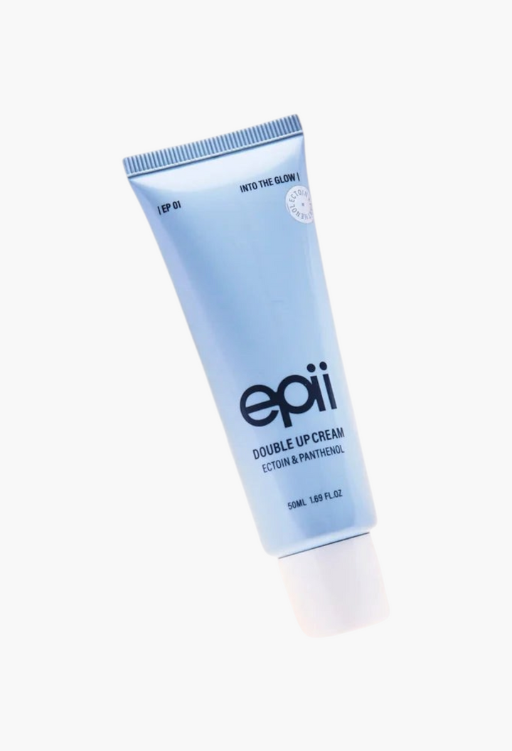 GLAM MODA Epii Double Up Cream with Ectoin and Panthenol in a light blue 50ml tube on a soft white fabric background.