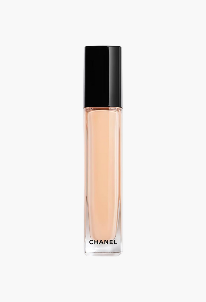 GLAM MODA CHANEL LES BEIGES serum concealer in a sleek glass tube with a black cap for illuminating the eye area.