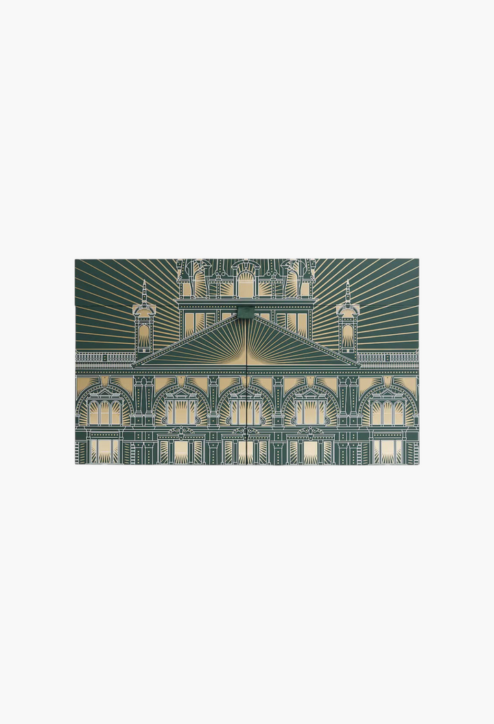 GLAM MODA 12 Days of Home Fragrance Advent Calendar 2026 in a dark green box with gold architectural illustration.