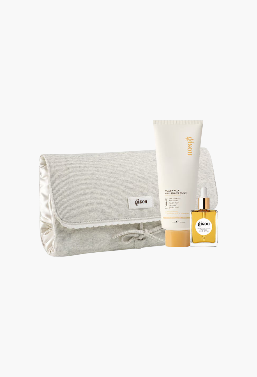 GLAM MODA Gisou Overnight Styling Pouch set with Honey Milk styling cream, hair oil, and a grey fabric travel case.