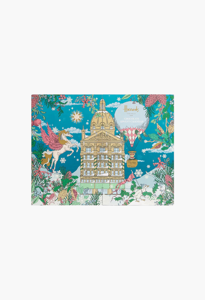 GLAM MODA chocolate advent calendar featuring a festive illustration of a palace, flying unicorn, and hot air balloon.