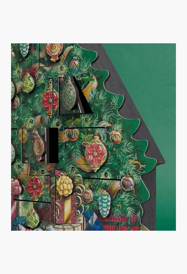 GLAM MODA wooden musical advent calendar featuring a festive Christmas tree design with numbered ornament doors.