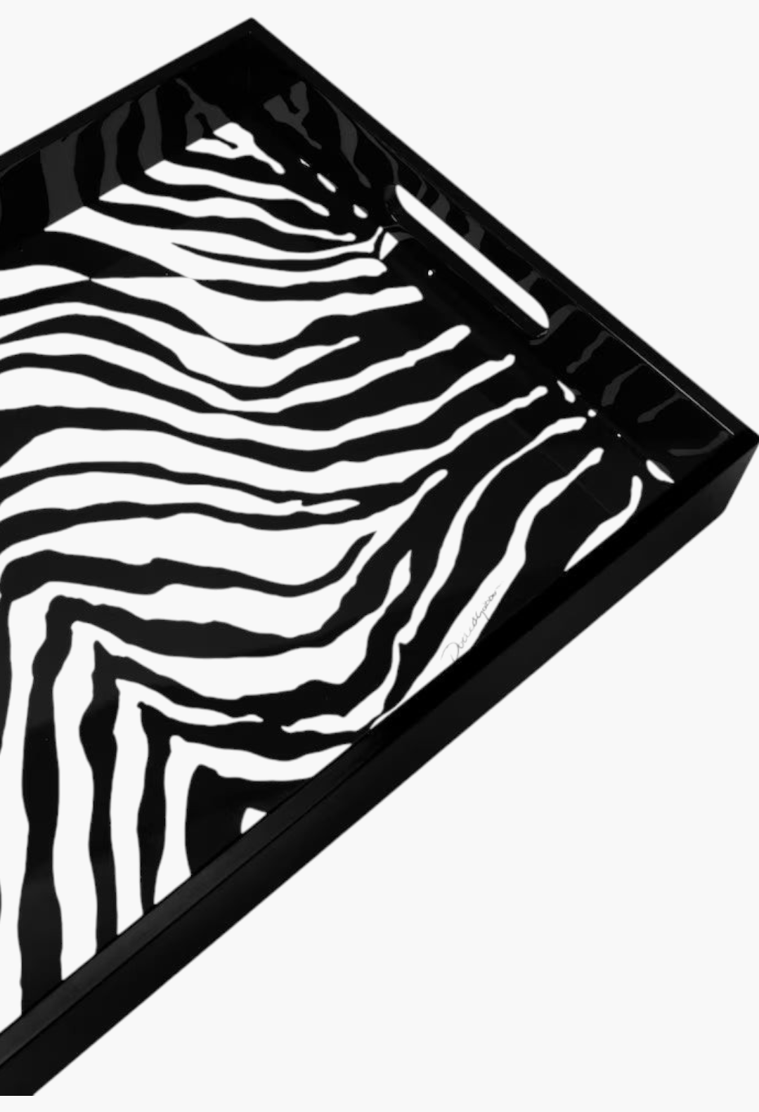 GLAM MODA Dolce&Gabbana wooden serving tray featuring a bold black and white zebra print pattern.