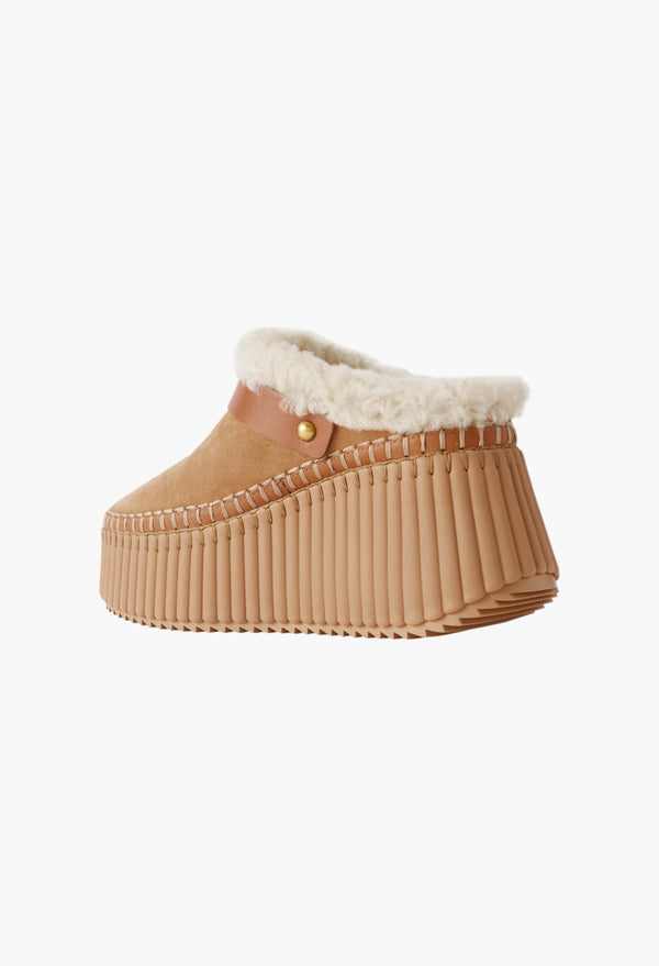 Nama Buckled Shearling-Lined Suede Platform Mules