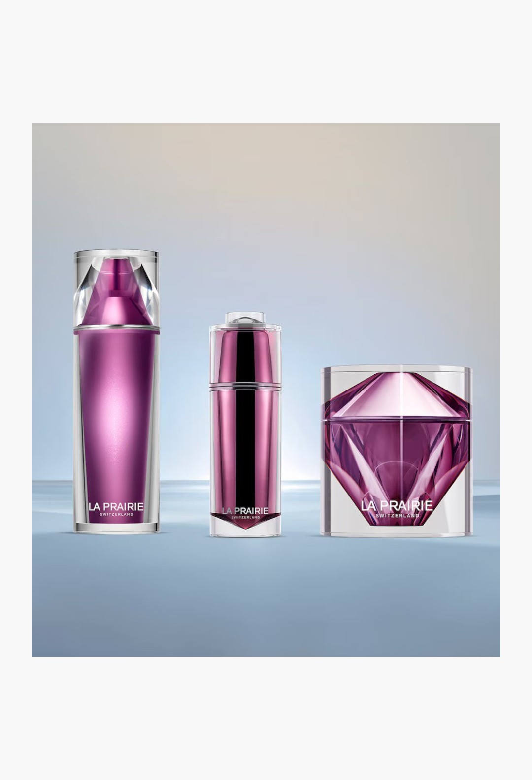 GLAM MODA La Prairie Platinum Rare skincare set featuring purple metallic bottles and a faceted cream jar