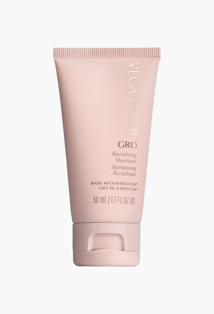 GLAM MODA VEGAMOUR GRO Revitalizing Shampoo in a light pink 50ml squeeze tube for thinning hair.