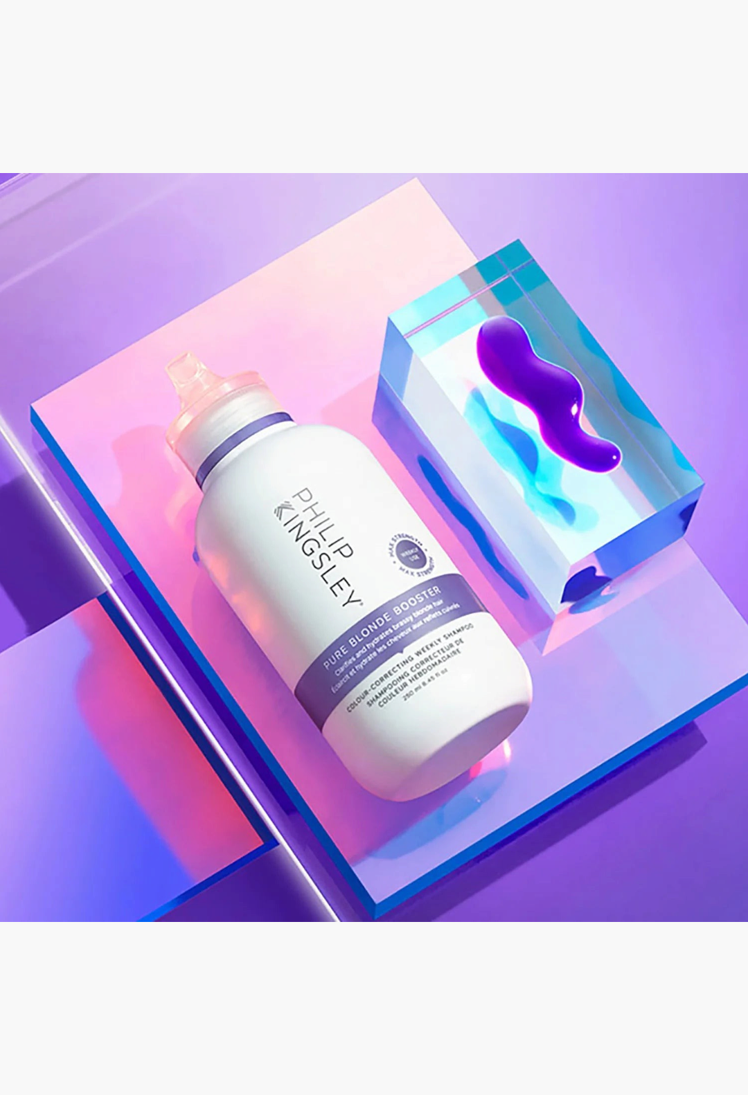 GLAM MODA Philip Kingsley Pure Blonde Booster Shampoo bottle with violet pigment on a modern purple display stand.