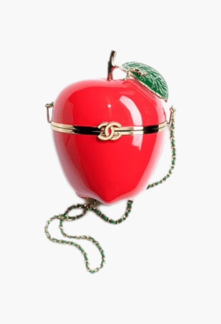 GLAM MODA apple-shaped minaudière in red enamel and gold-tone metal with a green leaf detail and chain strap.