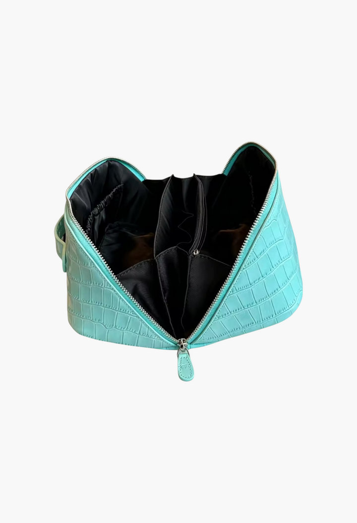 GLAM MODA sky blue genuine leather makeup bag with a crocodile-embossed texture and black interior compartments