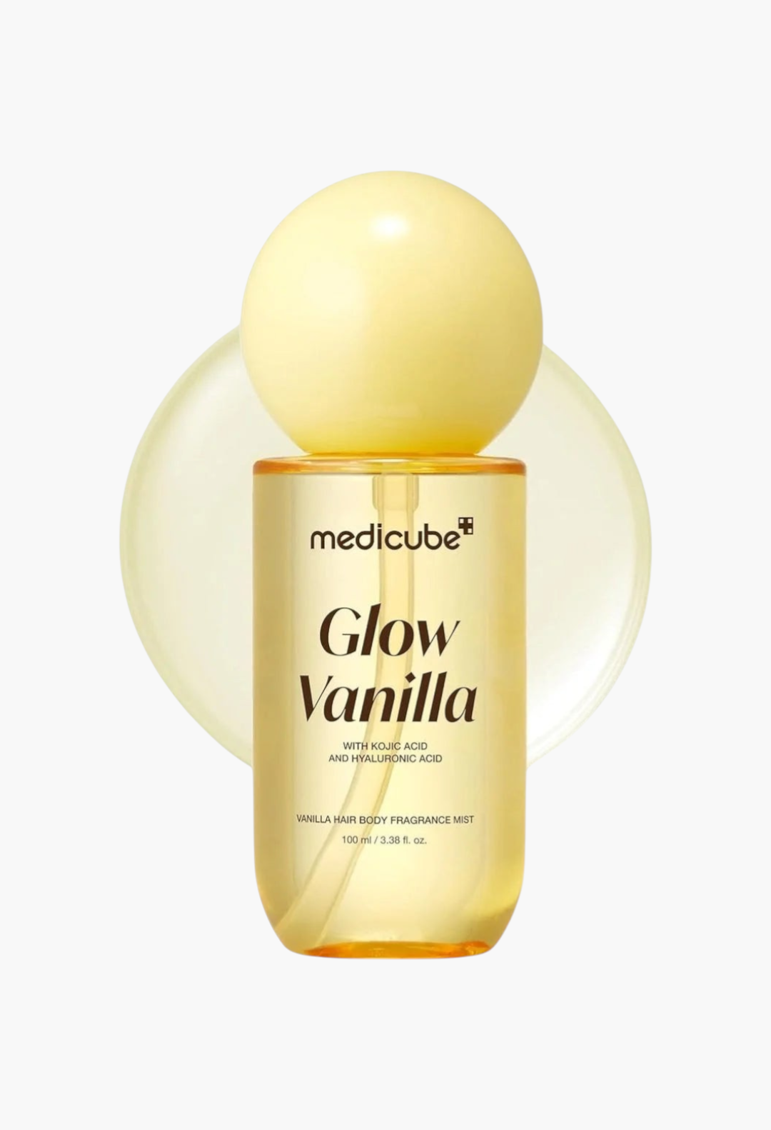 GLAM MODA Medicube Glow Vanilla hair and body fragrance mist in a clear bottle with a round yellow cap.